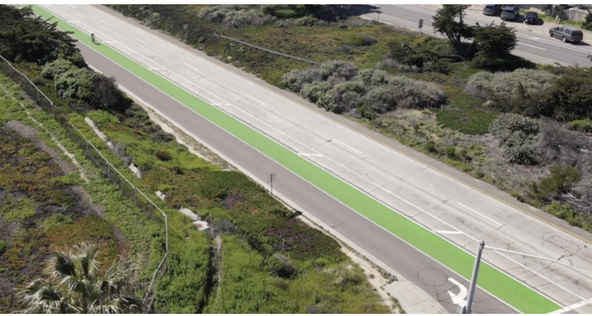 Green bike lane solid white line