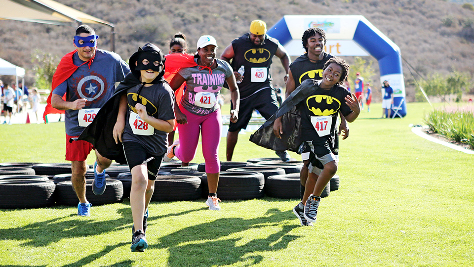 Teens running Super Hero Race
